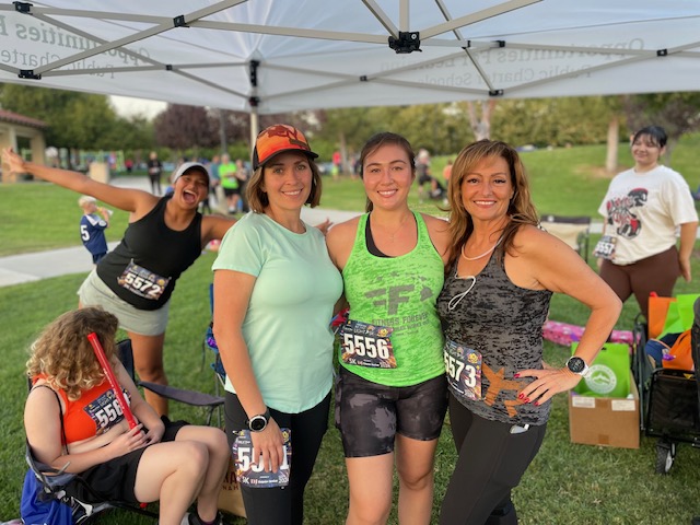 Opportunities For Learning staff and students proudly represented at the "Be the Light" run in Santa Clarita, hosting a booth with school information and swag giveaways while raising awareness and support for youth recovery through A Light of Hope.