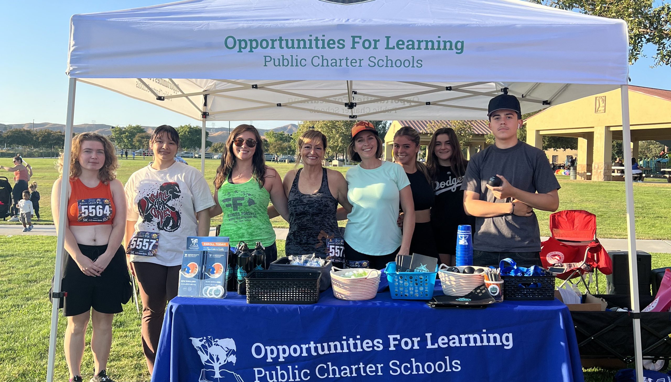 Opportunities For Learning staff and students proudly represented at the "Be the Light" run in Santa Clarita, hosting a booth with school information and swag giveaways while raising awareness and support for youth recovery through A Light of Hope.